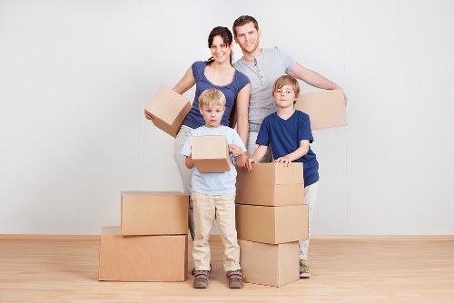 Professional man and van service handling a small move in North Woolwich