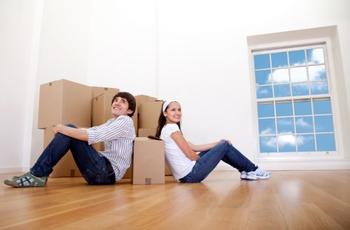 Packed storage boxes and furniture in a North Woolwich storage unit